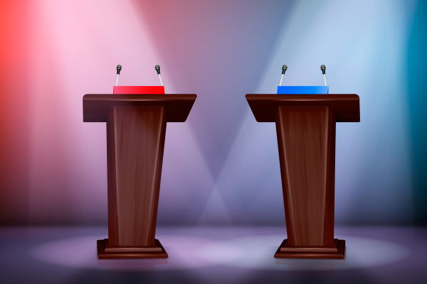 two podiums one with red light and the other with blue light