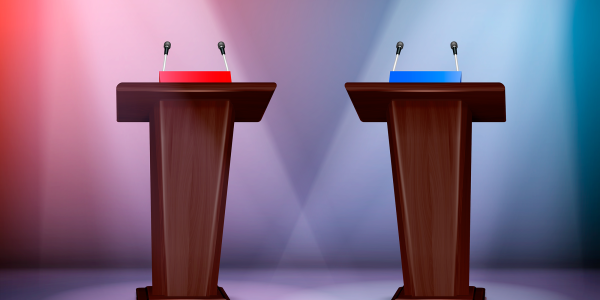 two podiums one with red light and the other with blue light