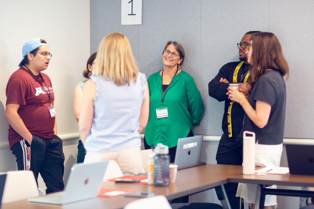 COMM team chatting during an icebreaker