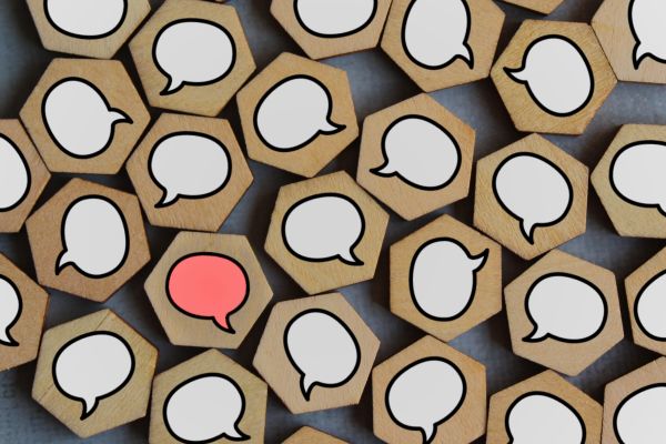 speech bubbles painted on wooden blocks