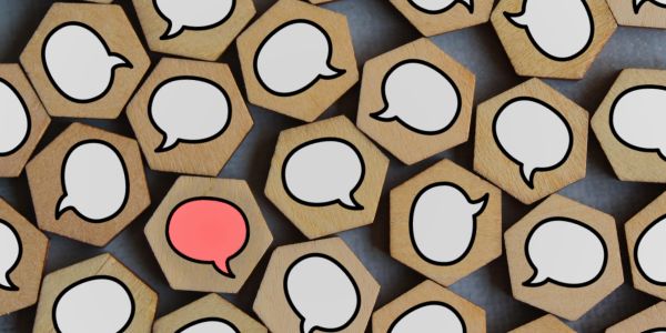 speech bubbles painted on wooden blocks
